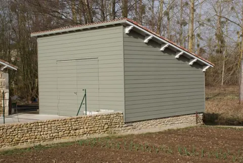 Garage ossature monopente bardé gris