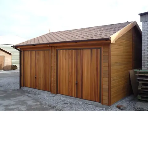 Garage ossature bardé bois rouge, deux portes