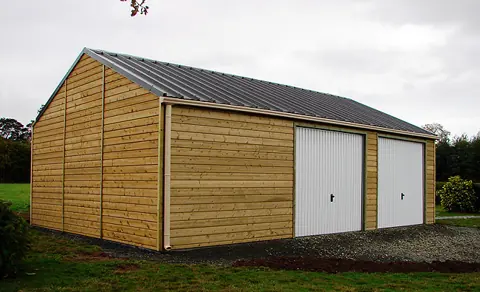 Garage ossature bardé bois, toit bac acier