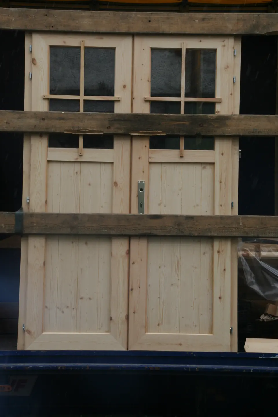 Porte double vitrée en bois pour garage